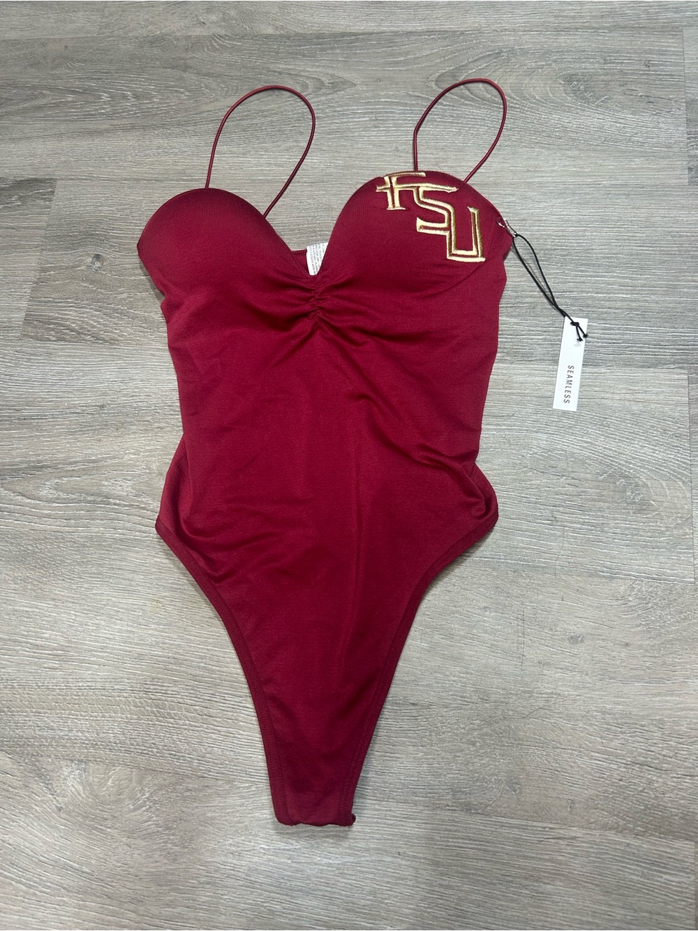 Foreve 21 NWT Florida State University burgundy bodysuit with a gold embroider S